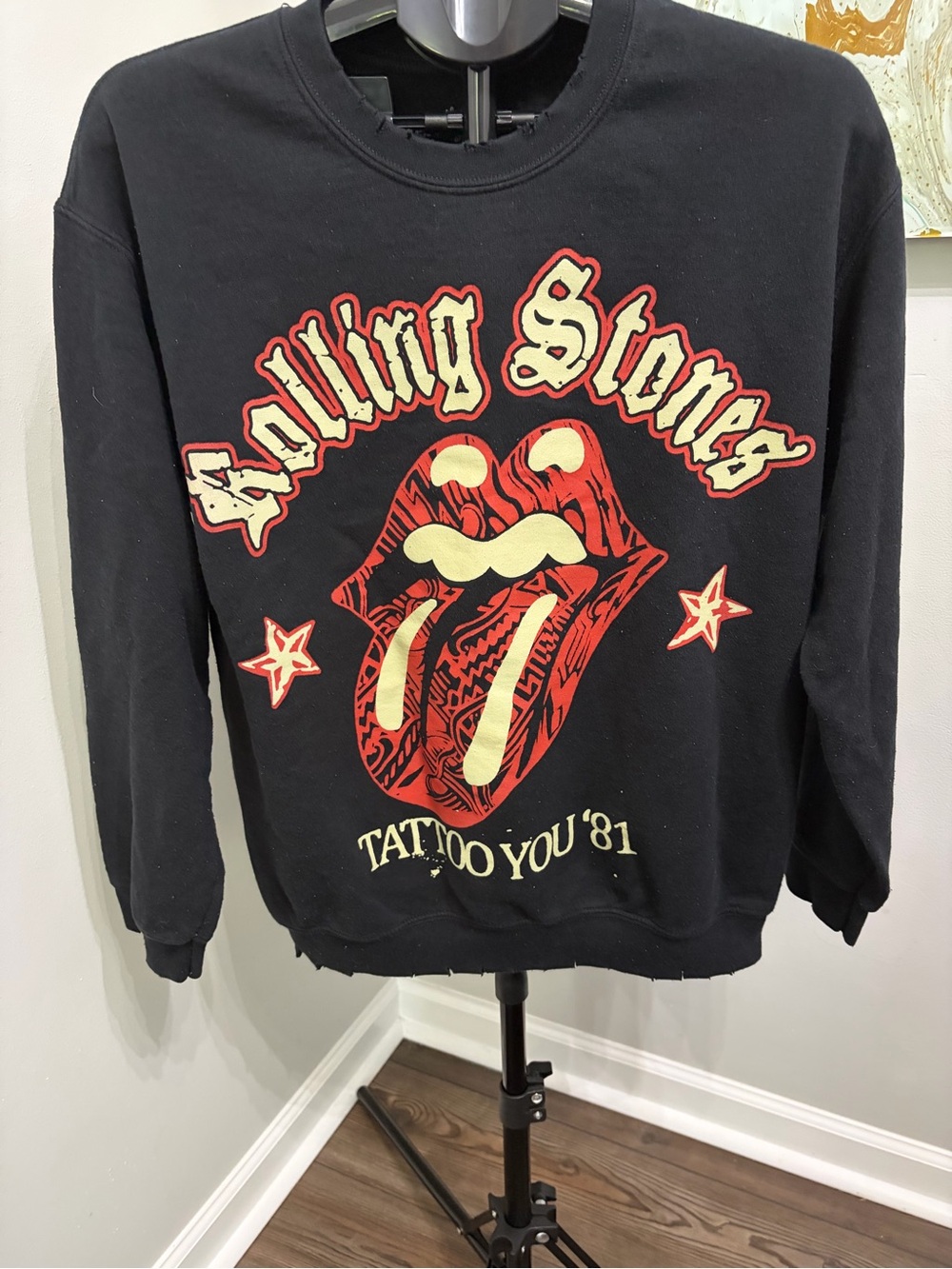 the Rolling Stones Black Crewneck with Red & Cream Tongue Graphic